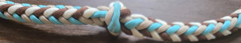 A real Money Run braid in Desert Turquoise with a grip knot