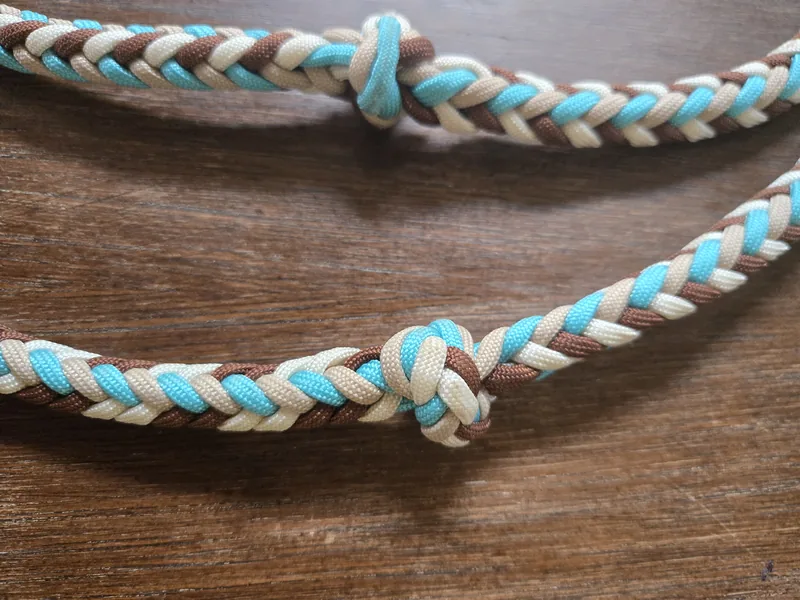 Close-up of two grip knots in Desert Turquoise braids